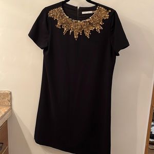 Little Black Dress with sequin and rhinestone detail at neckline
